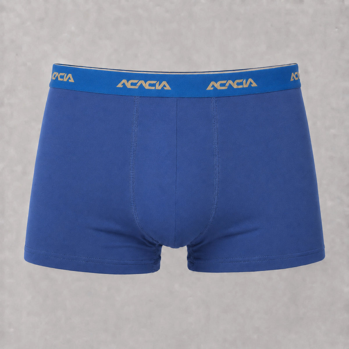 Front view of Acacia men’s petrol blue trunks with short legs, a wide waistband, golden beige logos, and matching seams.